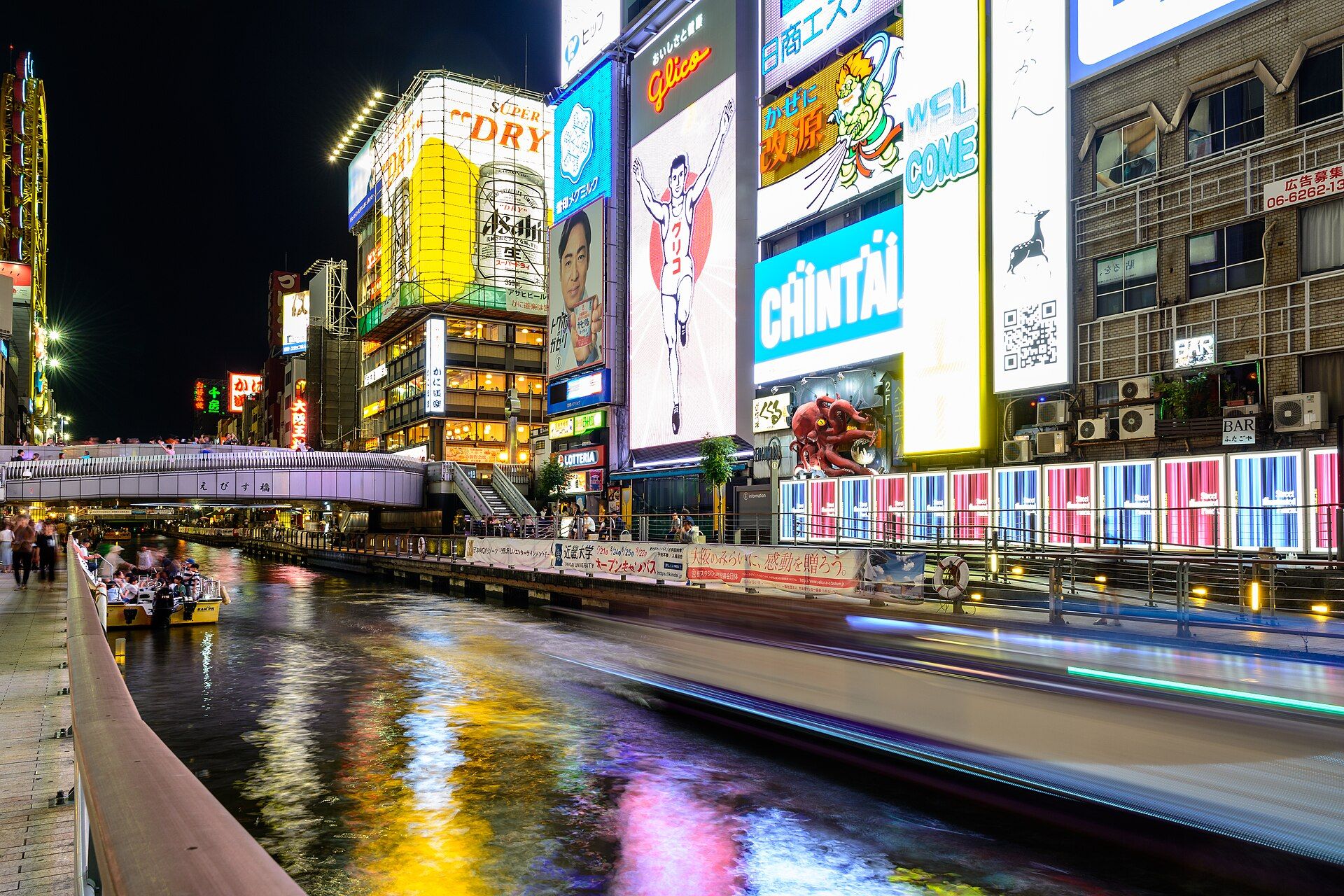 The neon-lit Dotonbori canal at night