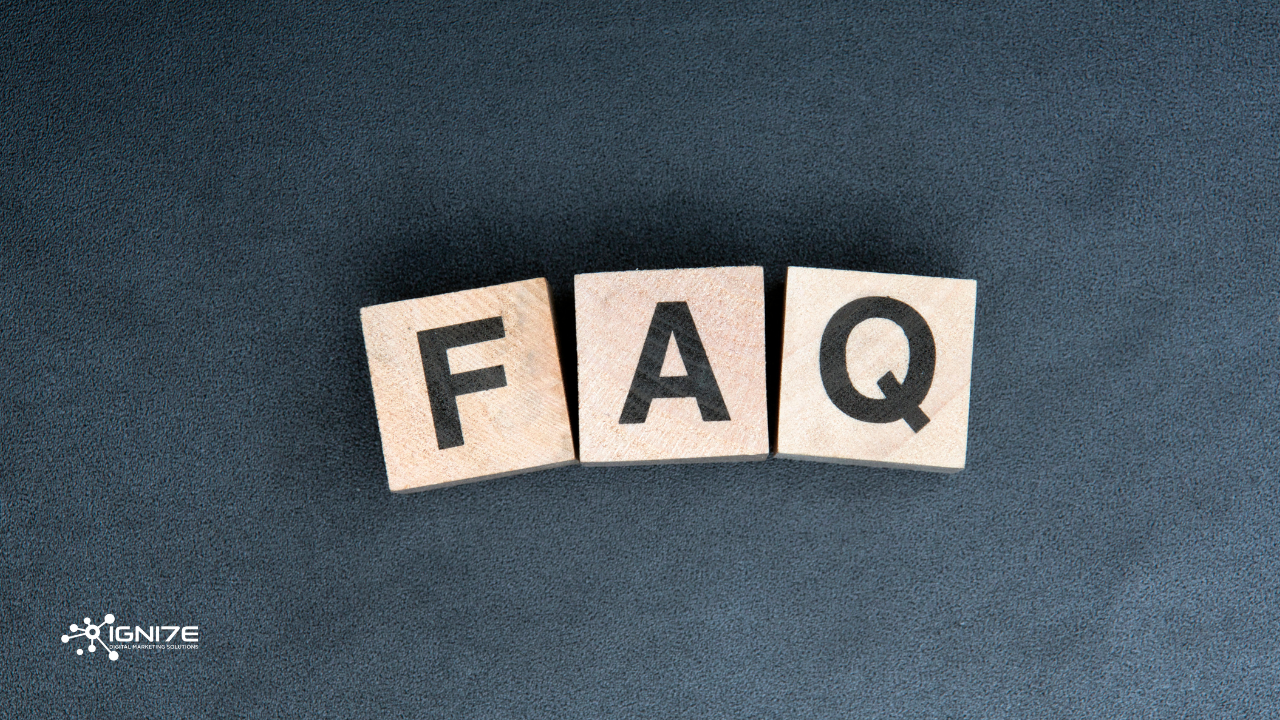 Three wooden blocks spelling FAQ on a dark textured background