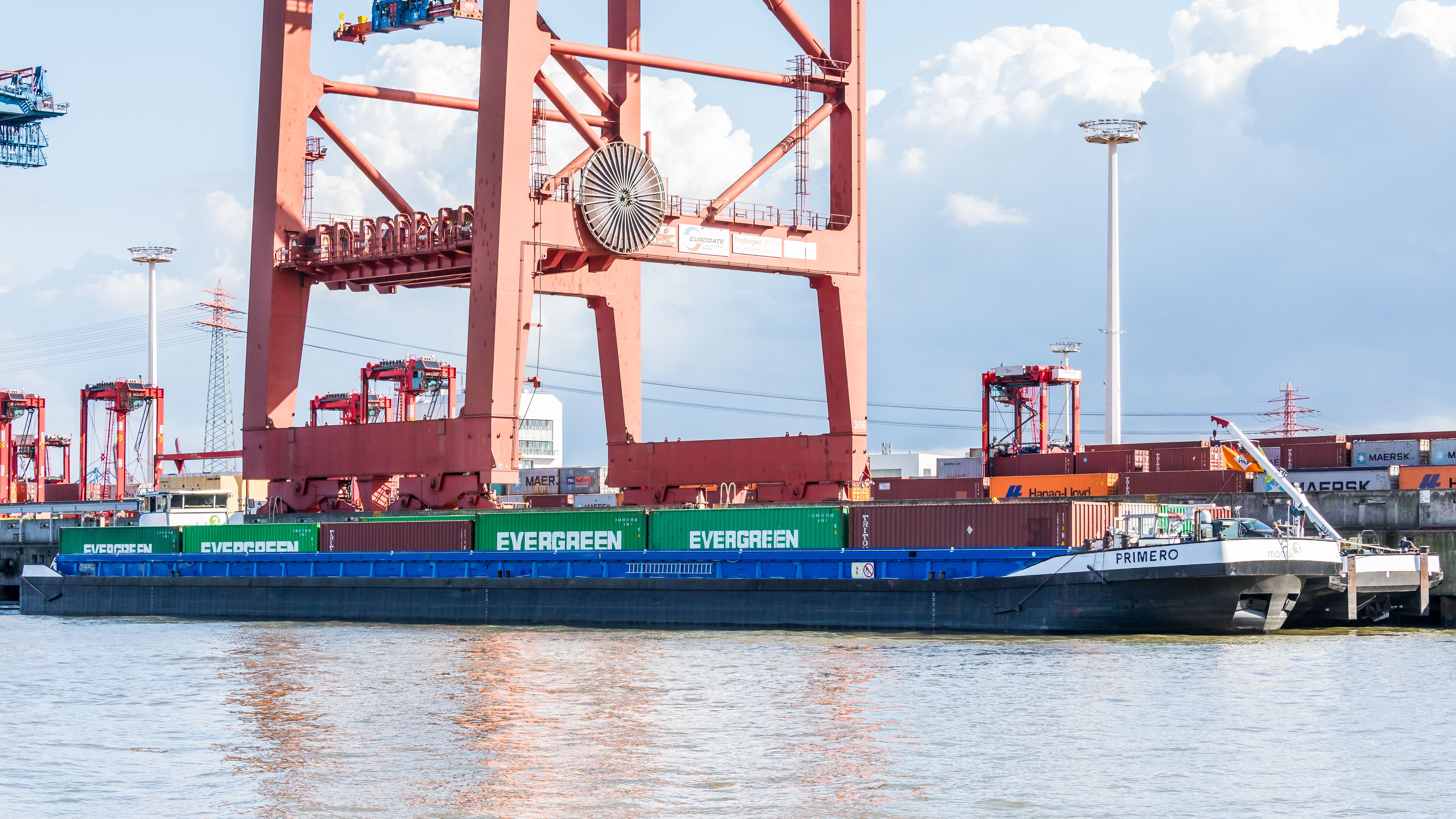 Cargo ship at container port terminal
