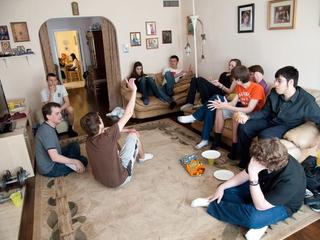 Teens sitting down for church youth group discussion