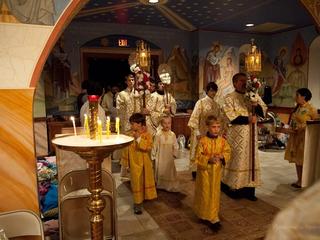 Children entering the church on Pascha