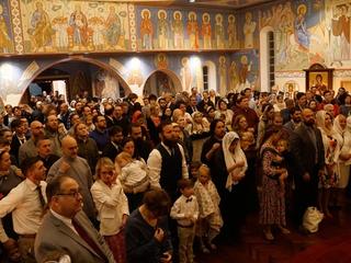 The congregation returns from the candlelight procession to a brightly lit church and they now begin the Paschal Divine Liturgy