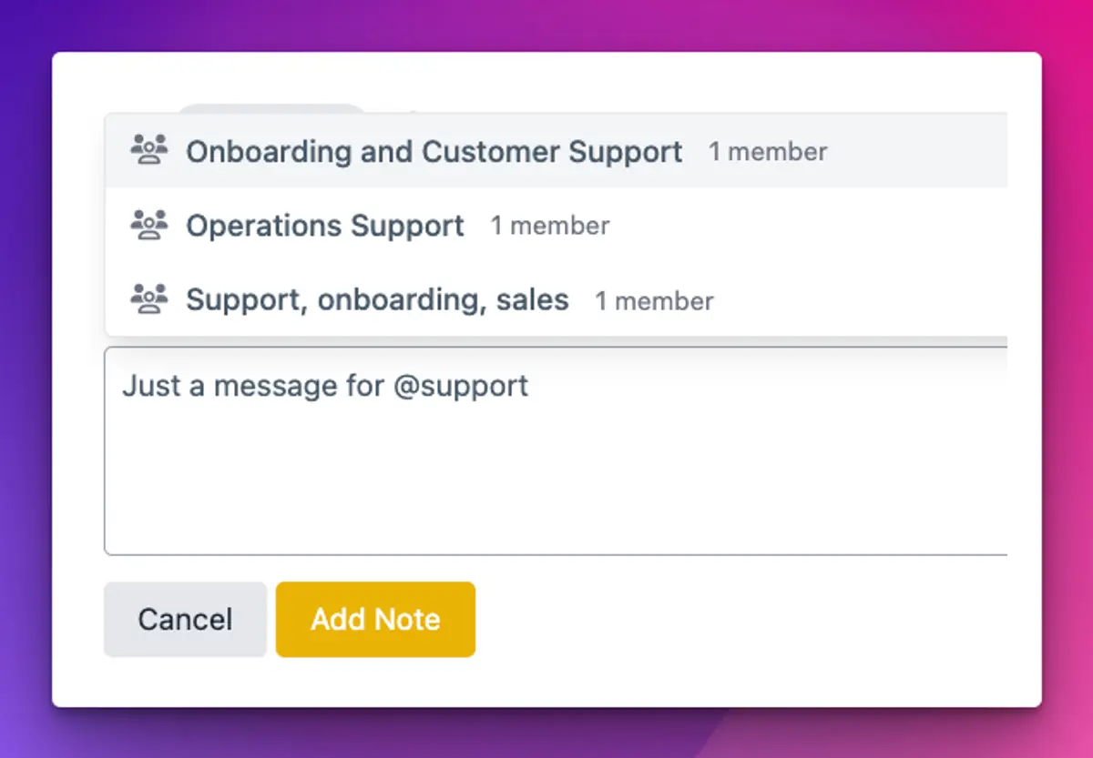 The mention menu open under a message, listing three matching roles with the number of members in each