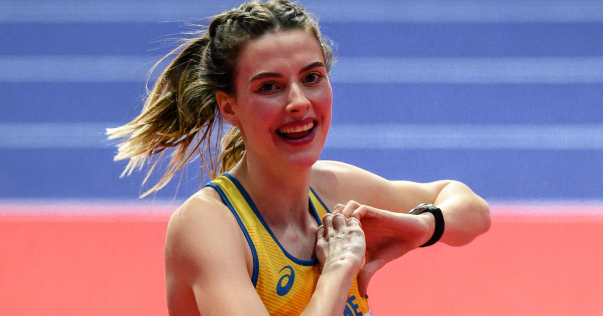 Ukraine's Yaroslava Mahuchikh celebrates winning the 2022 World Indoor Championships high jump just weeks after the Russian invasion of her home country.