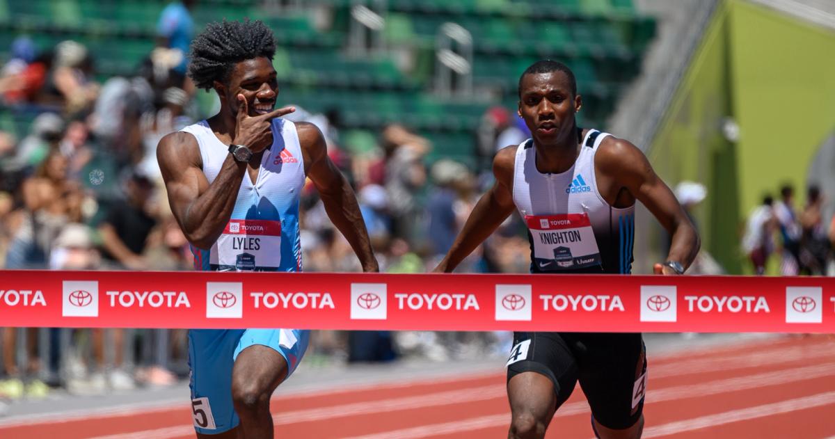 Noah Lyles and Erriyon Knighton at the finish line of the 2022 USATF Outdoor Championships.