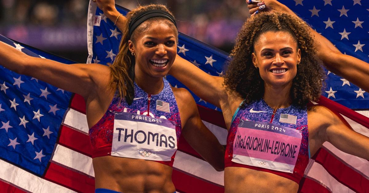 Gabby Thomas and Sydney McLaughlin-Levrone after the 4x400m relay at the 2024 Paris Olympics.