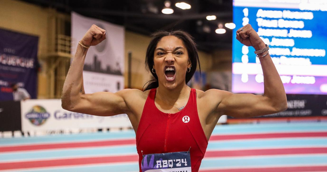 Tara Davis-Woodhall celebrates after winning the USATF Indoor Track and Field Championships.