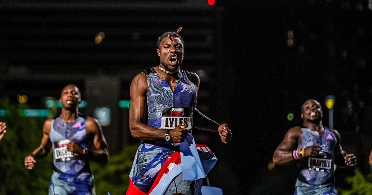 Noah Lyles celebrates winning the men's 150m at the Atlanta City Games.