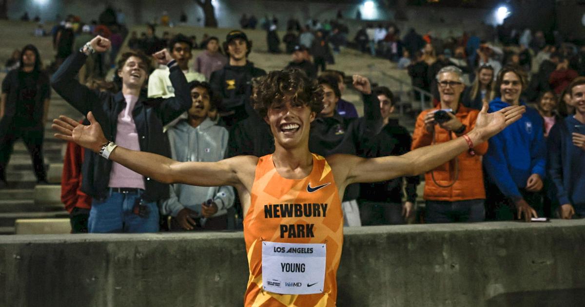 Lex Young celebrates with friends and family after breaking the high school 5000m record at the LA Grand Prix.