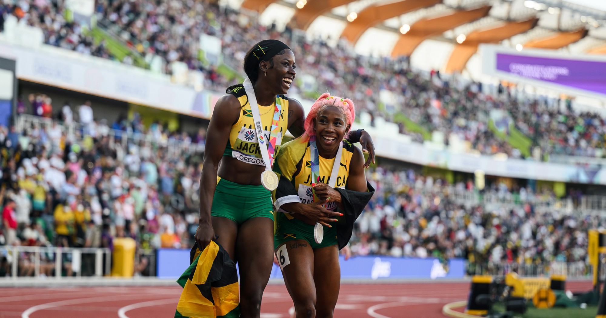 Shericka Jackson and Shelly-Ann Fraser-Pryce celebrate going 1-2 at the 2022 World Championships.