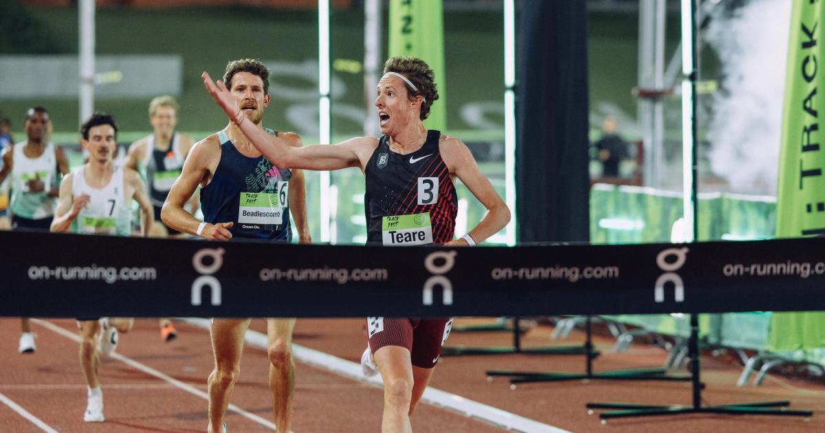 Cooper Teare celebrates before the finish line of the men's 5000m at Sound Running's Track Fest