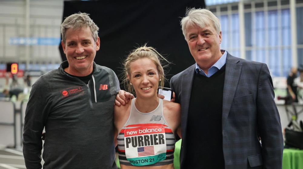 Mark Coogan alongside Elle Purrier and agent Ray Flynn after she broke the two-mile American record at the 2021 New Balance Indoor Grand Prix.