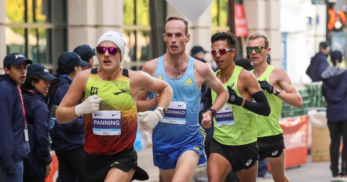 Zach Panning, Matthew McDonald and Nico Montanez at the 2022 Chicago Marathon.