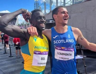 Peter Bol and Guy Learmonth representing Fast 8 Track Club at the 2022 Commonwealth Games.