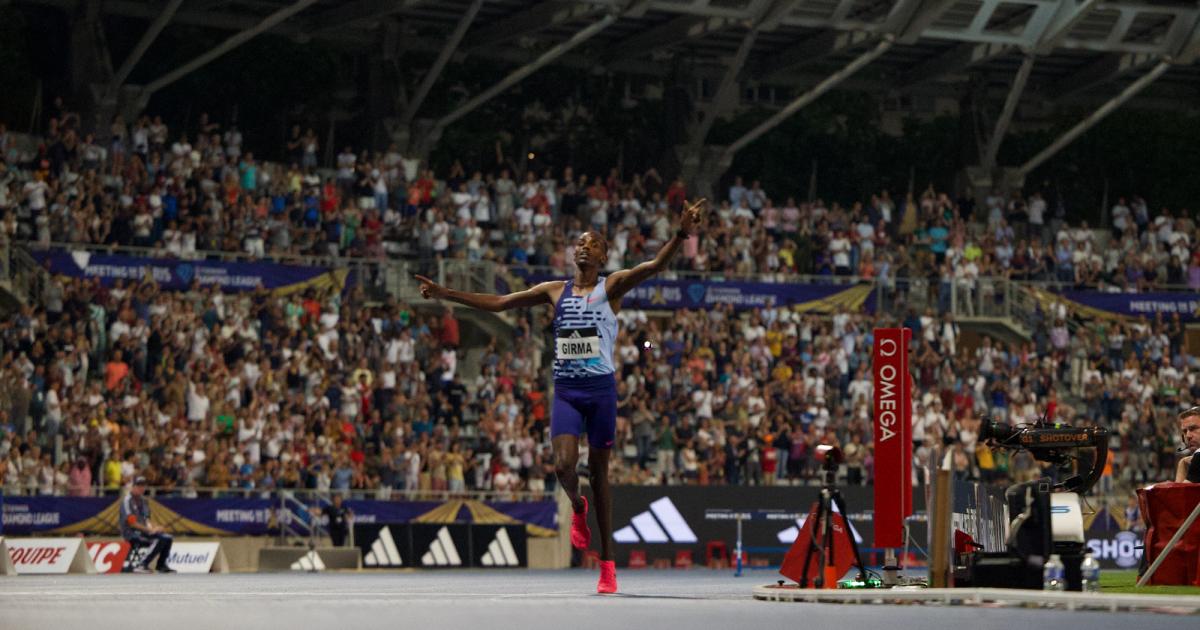 Ethiopia's Lamecha Girma breaks the 3000m steeplechase world record.