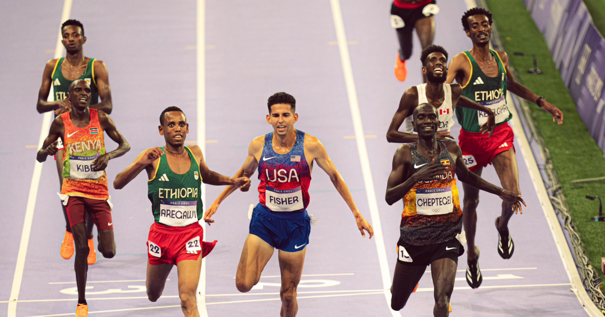 The lead pack crossing the finish line in the men's 10,000m final in Paris.