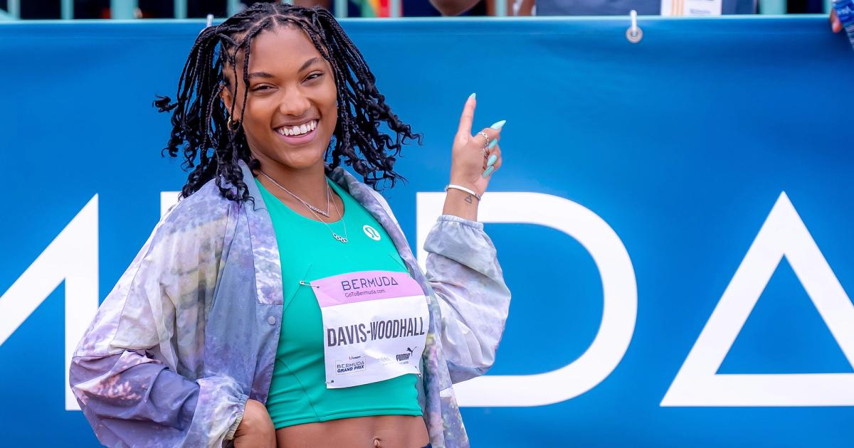 Tara Davis-Woodhall celebrates after winning the Bermuda Games women's long jump with a 7.11m mark.