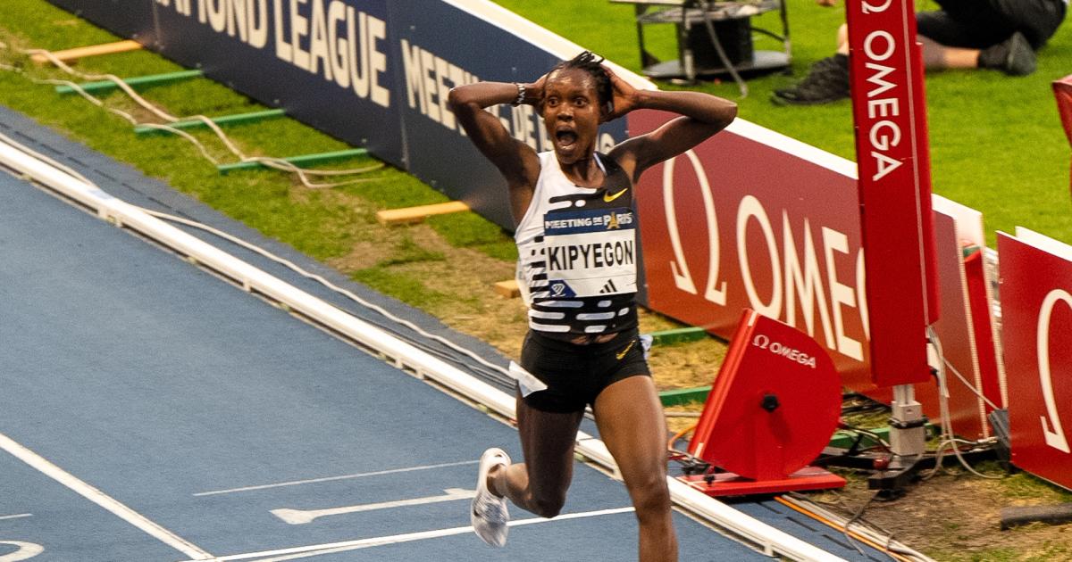 Faith Kipyegon crosses the finish line at the Paris Diamond League and breaks the women's 5000m world record.