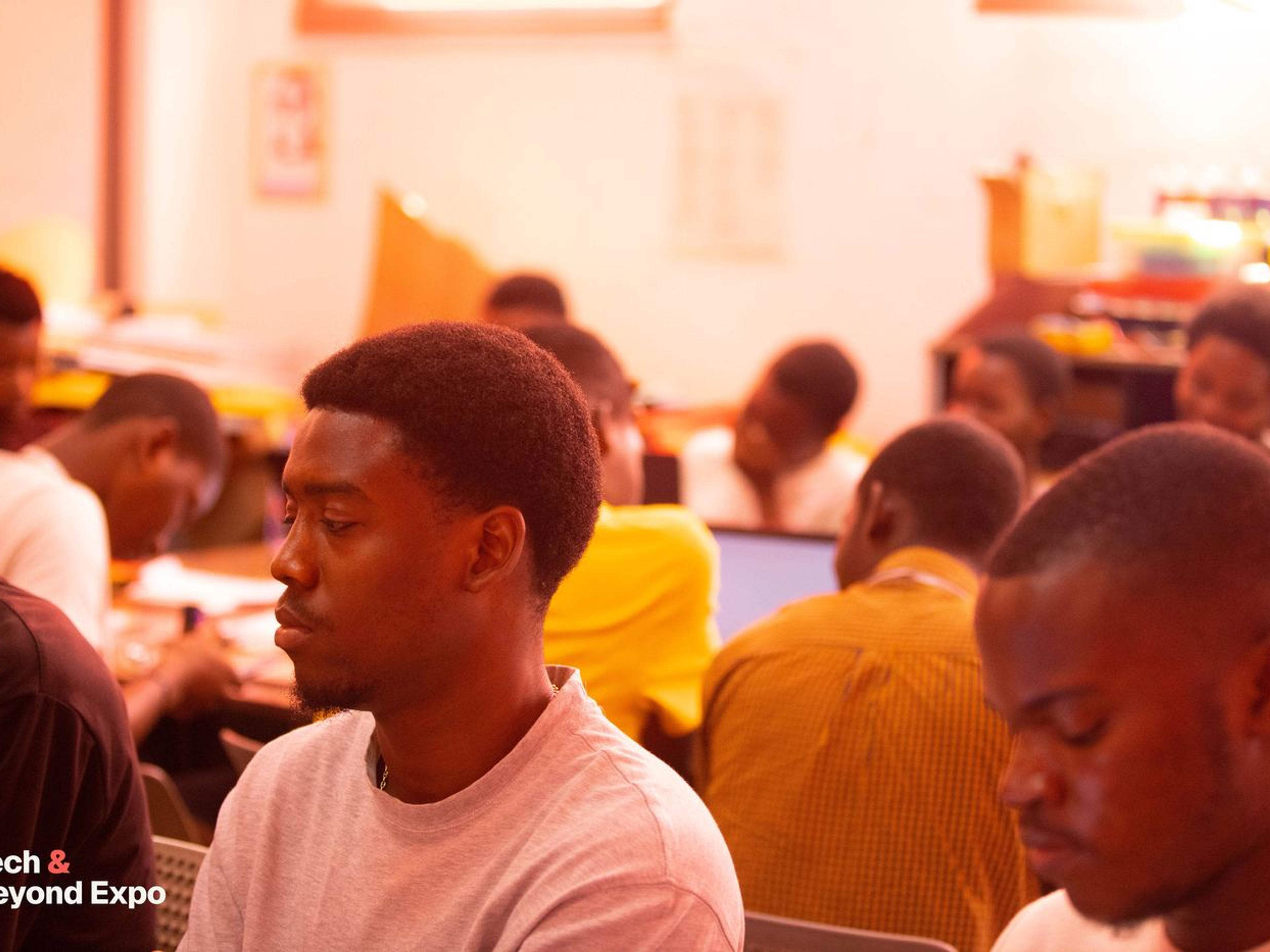 Participants working on laptops during a hands-on session