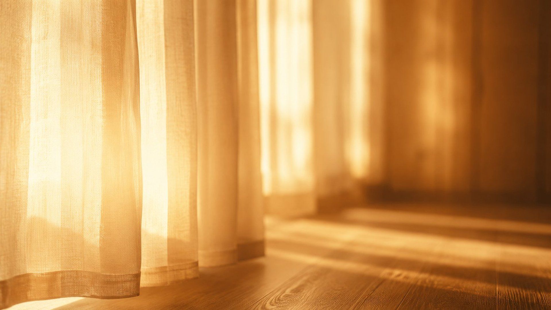 Warm morning light through sheer curtains