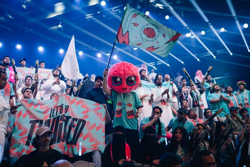 Twisted Minds fans celebrate their team at EWC 2025