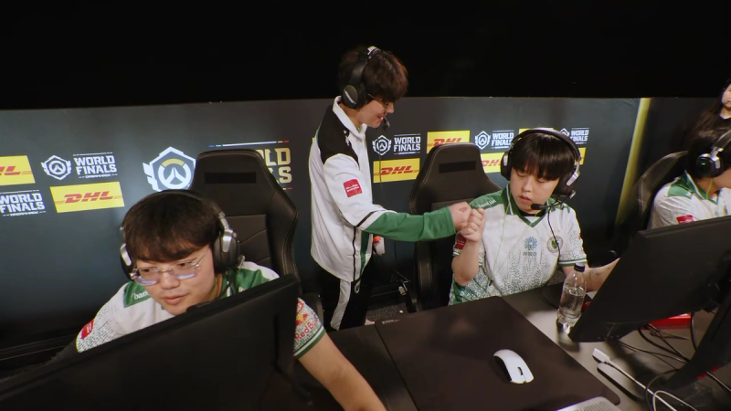 Team Falcons celebrate their round 1 win.