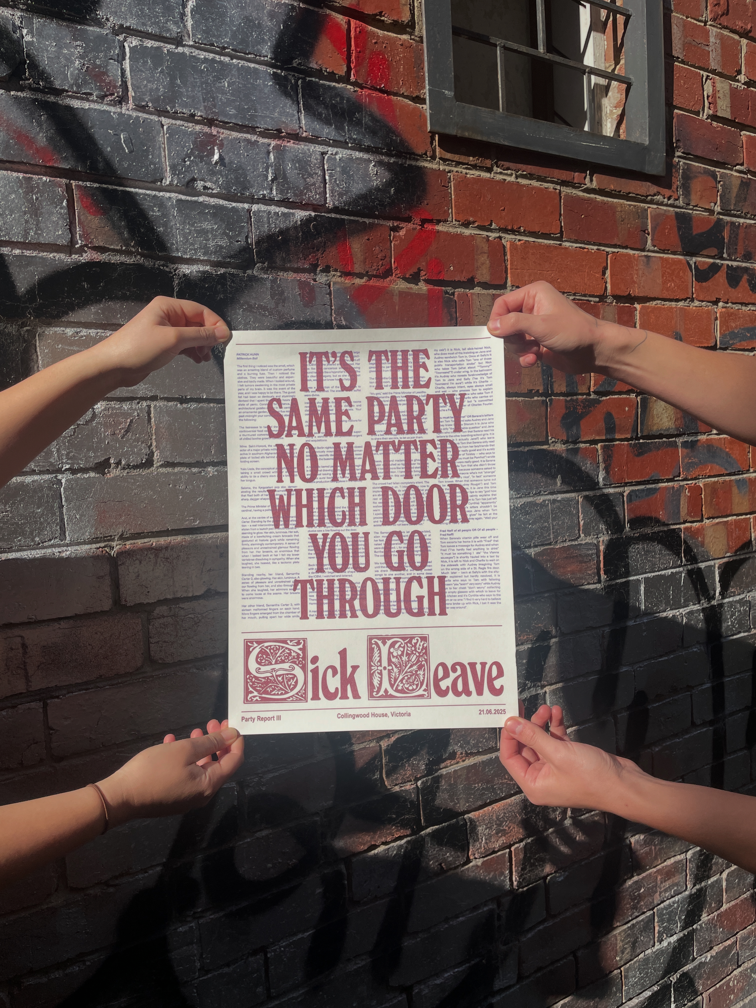 poster on brick wall