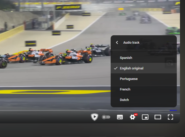screenshot of the YouTube player with options to change audio tracks of a video