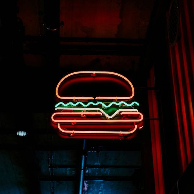 How martinis and Cheesburgers became the new status pairing