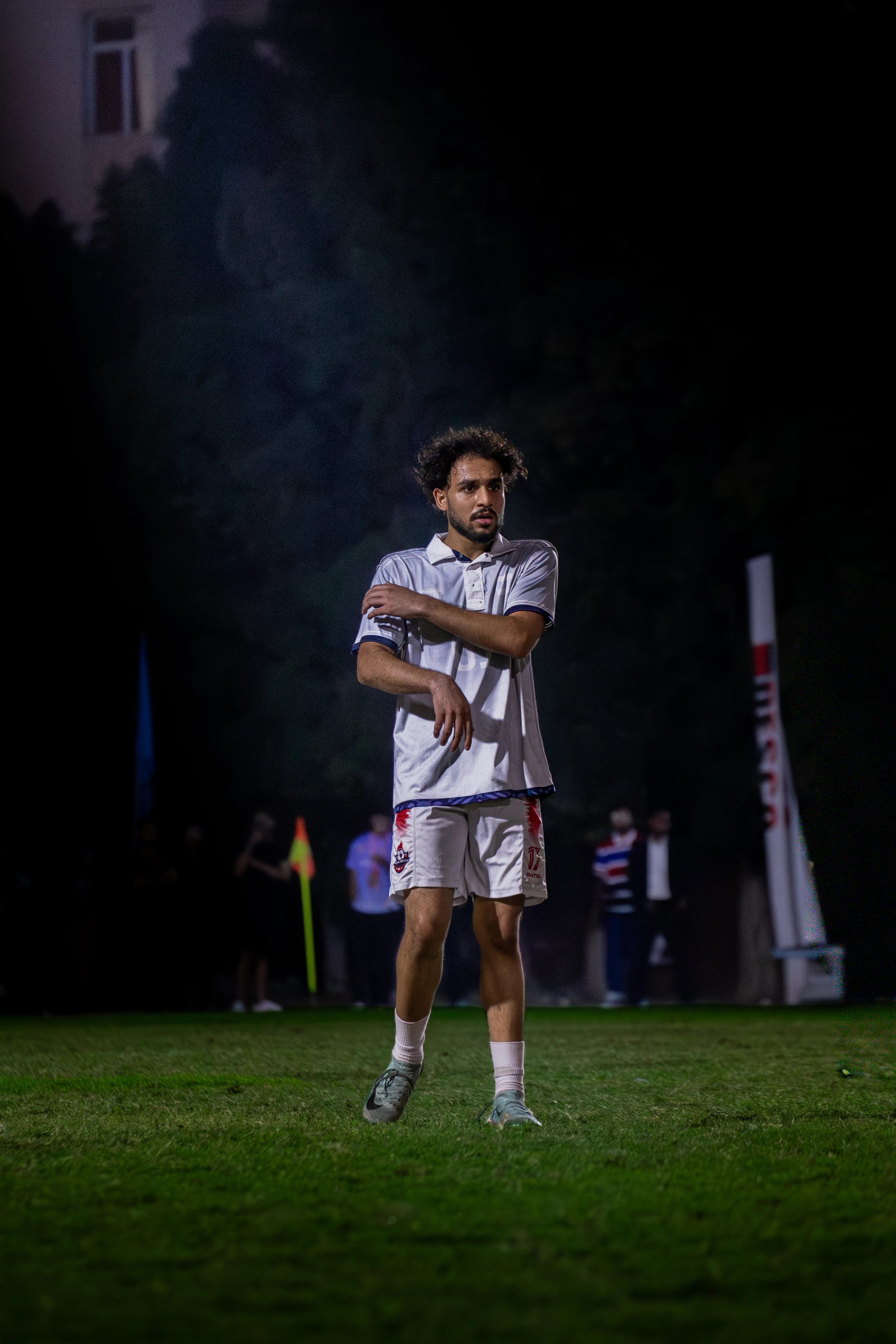 Football player standing on the pitch