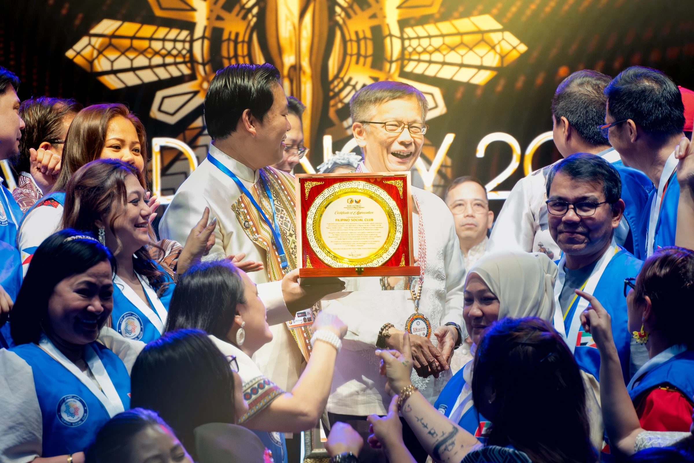 Gawad Pinoy award presentation surrounded by attendees