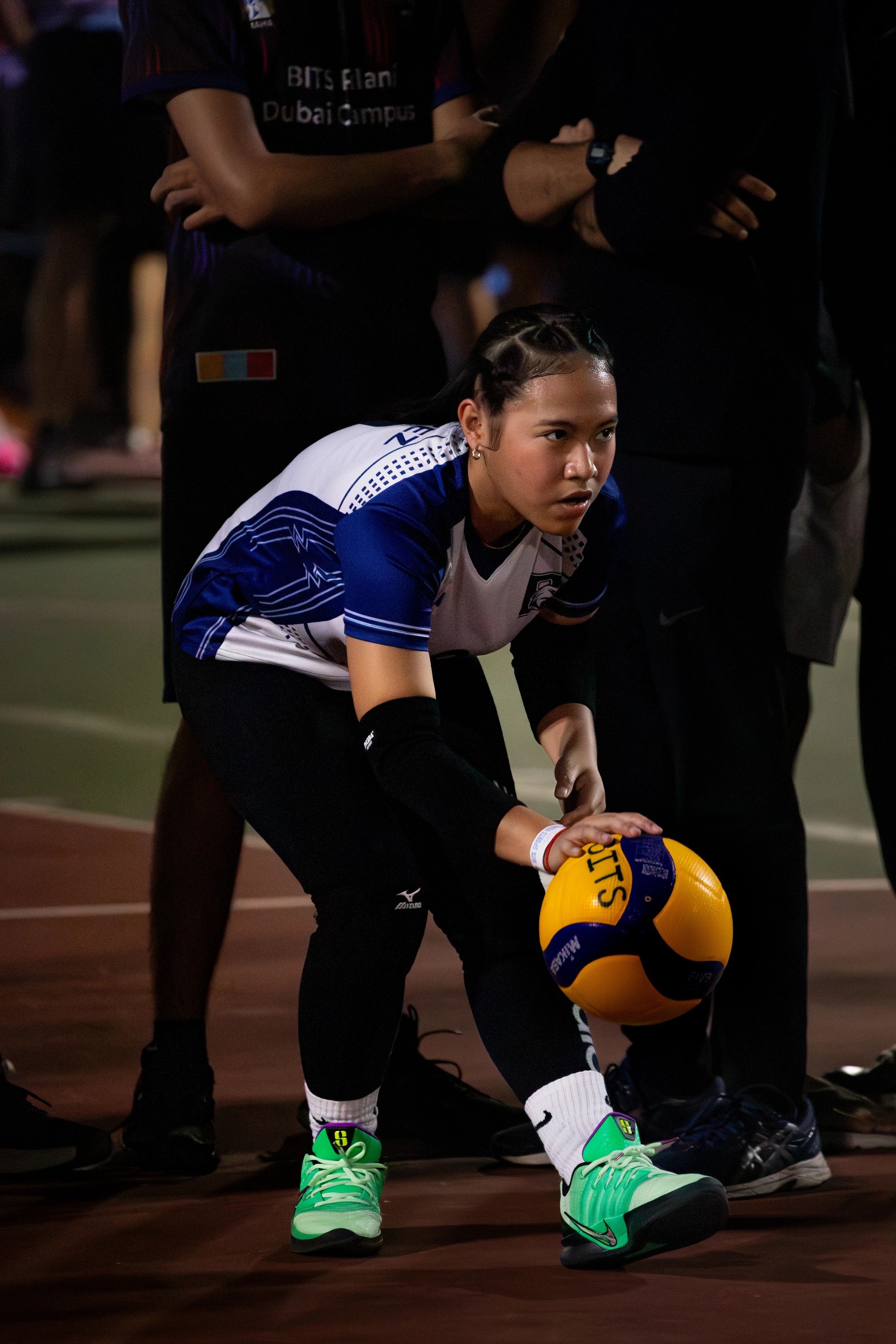 Volleyball player holding the ball before play