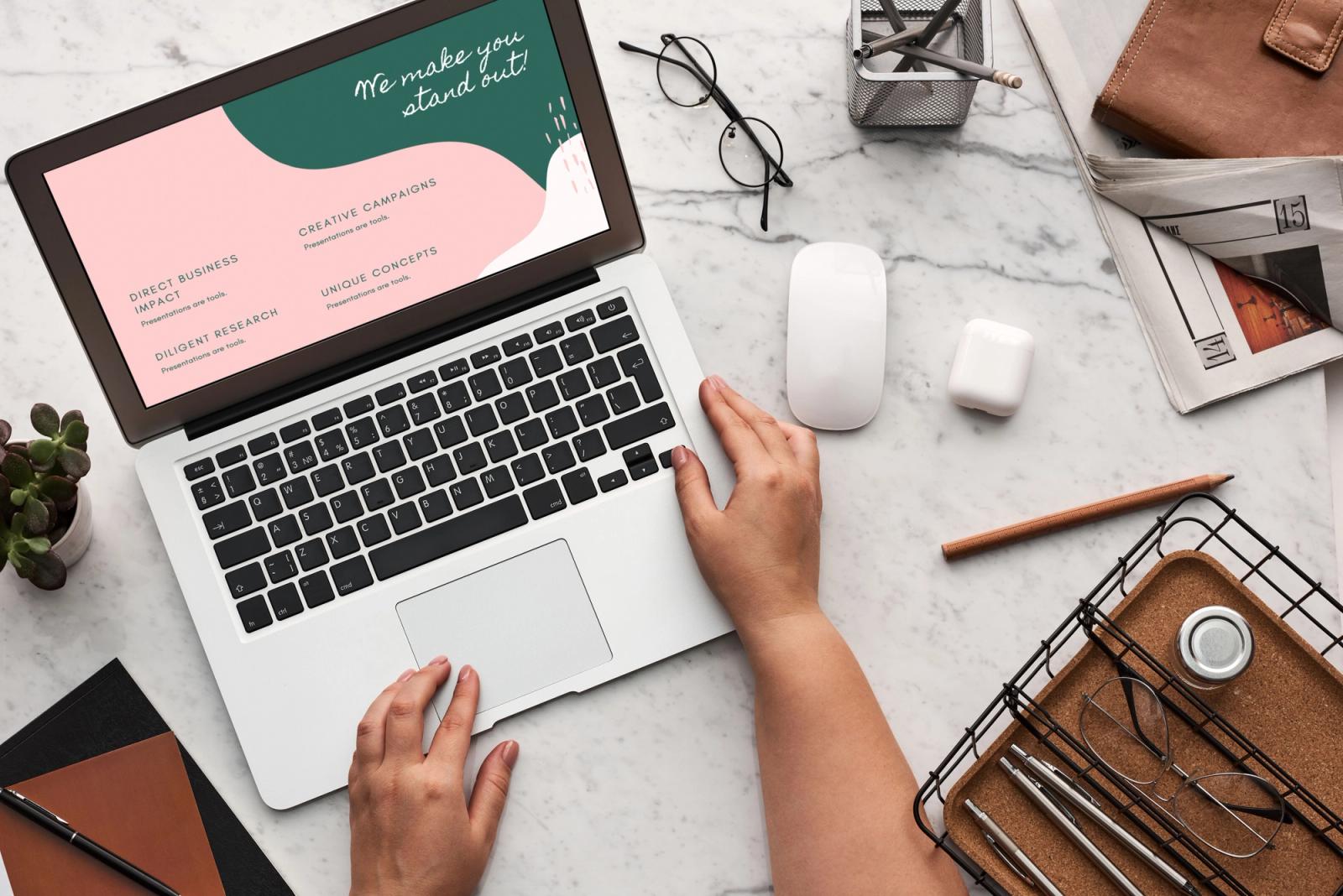 Laptop workspace for evaluating email marketing software