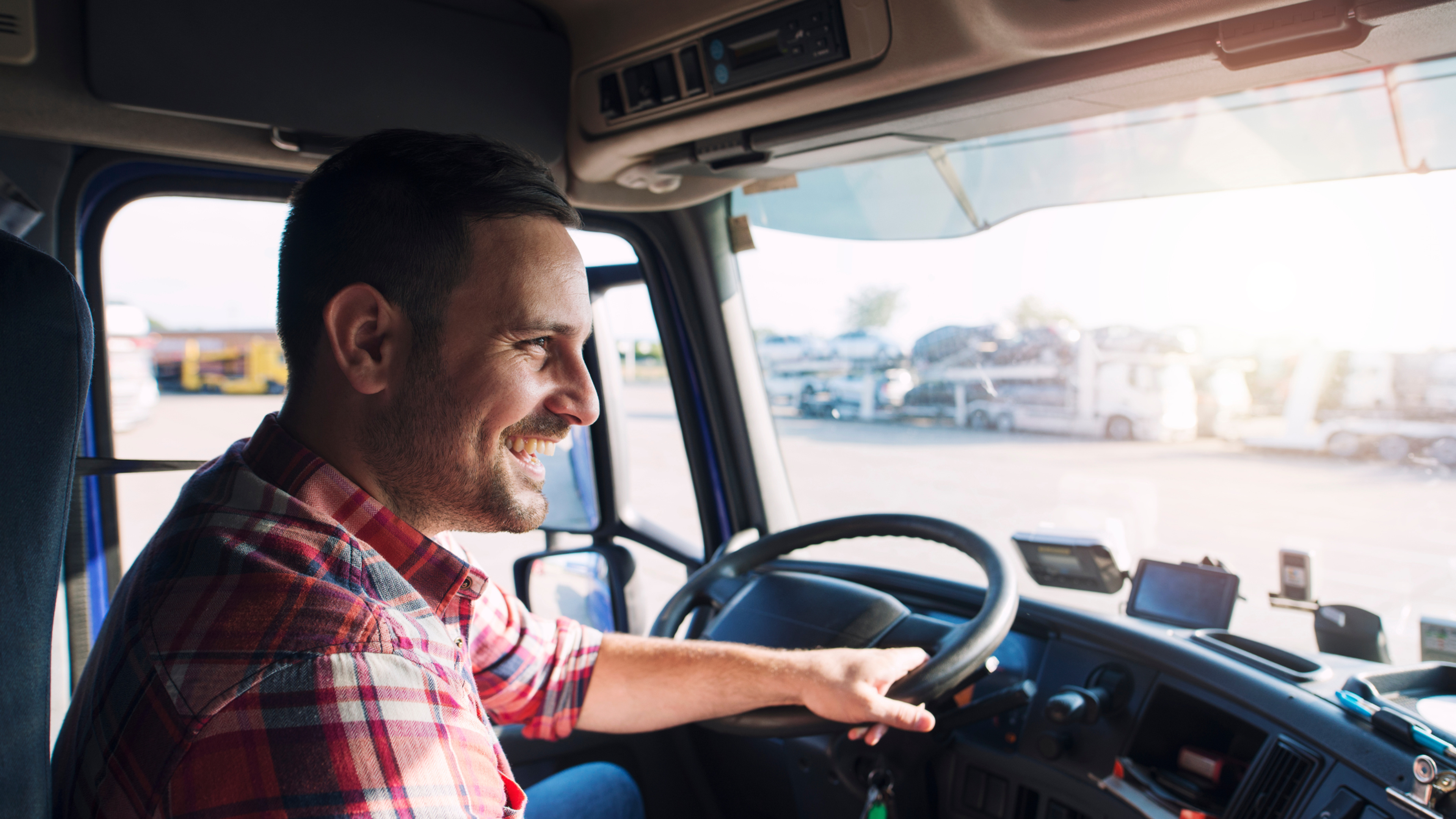 A man enjoying a comfortable truck seat