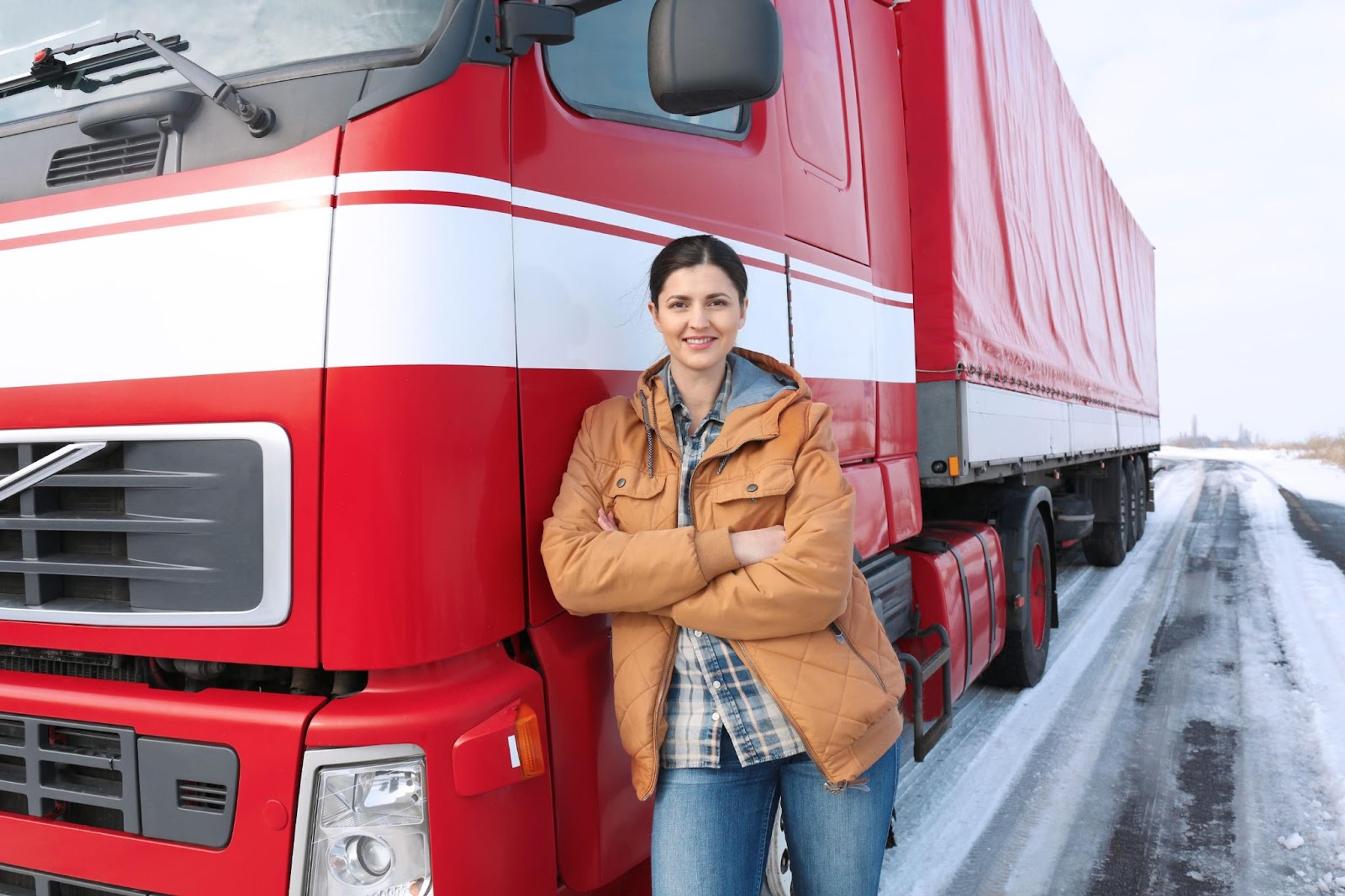 Woman Standing By SemiTruck