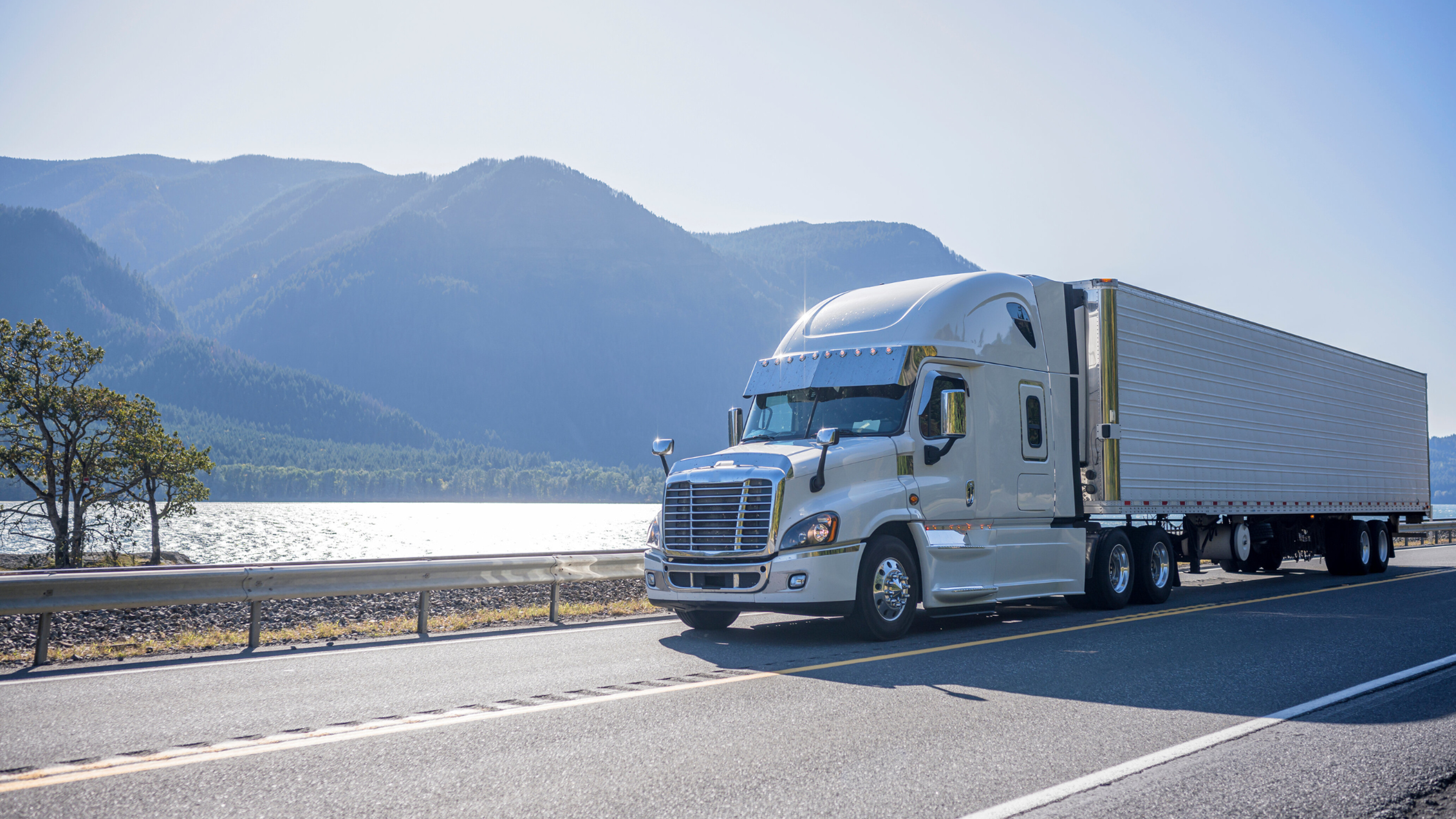 A White semi-truck equipped with great quality truck parts and accessories