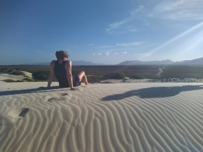 Sitting in sand dunes in Brazil