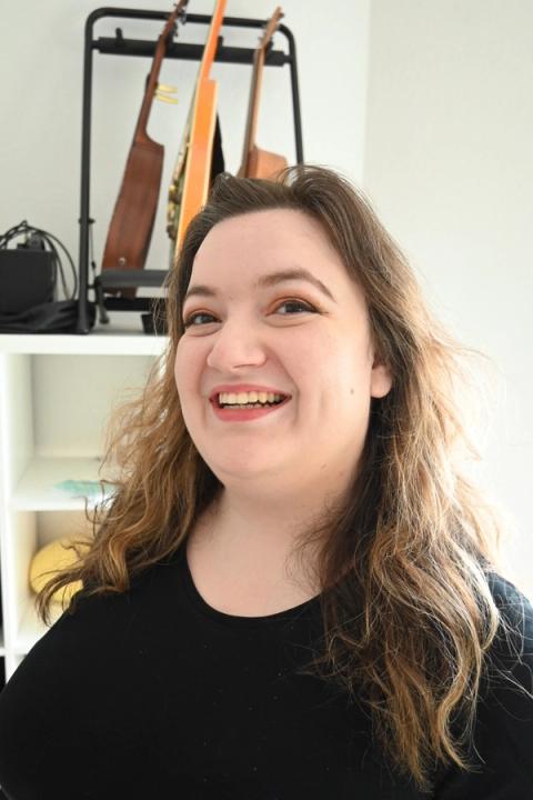 Leda Wolf with a wide smile on her face
