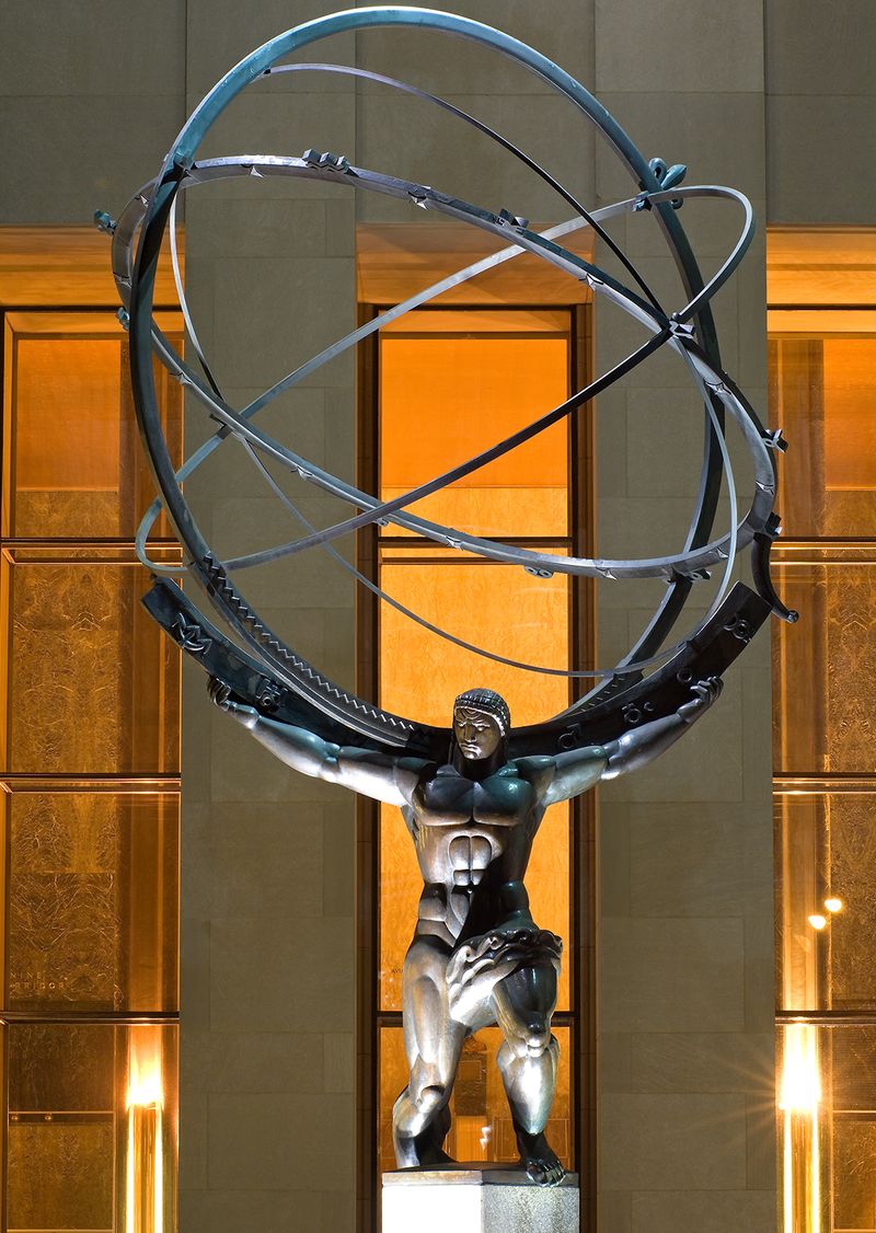 Sculpture of Greek Titan Atlas holding the heavens on his shoulders in front of Rockefeller Center.