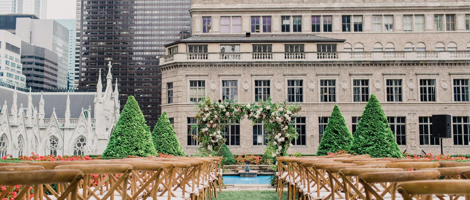 NYC rooftop garden wedding venue with views of Fifth Avenue and St. Patrick's Cathedral.