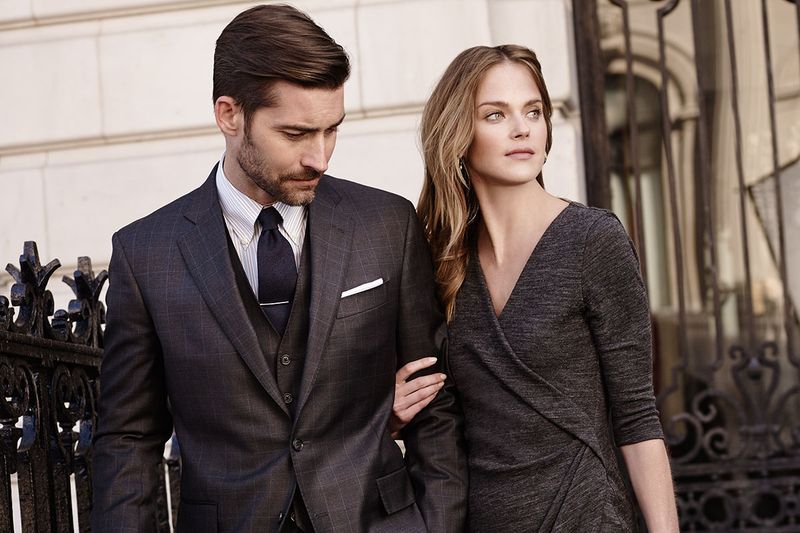 male and female Brooks Brothers models in business attire 