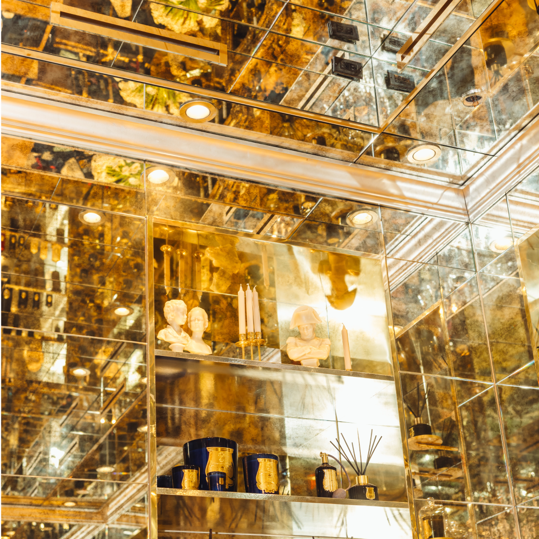 A mirror, floor-to-ceiling product display at Trudon at Rockefeller Center