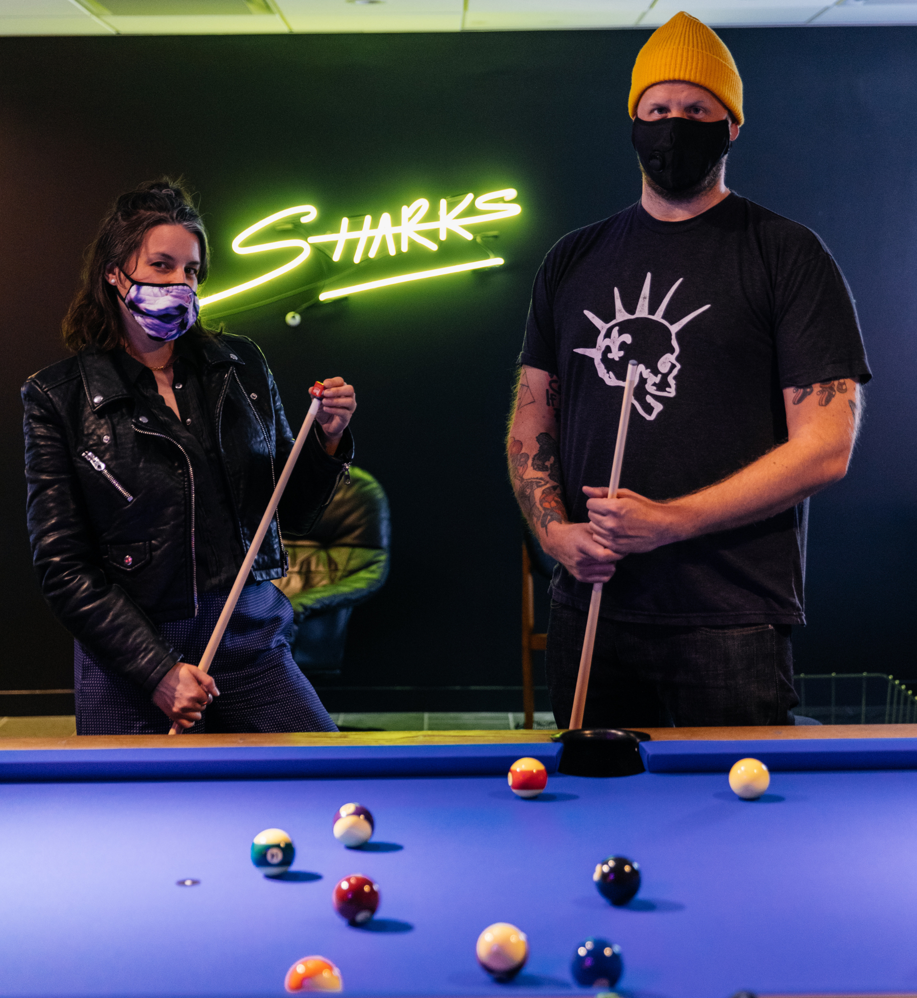 Sharks Pool Club CEO Jessica Resler and COO Dusty Hollensteiner playing pool at the Sharks Pool Club in Rockefeller Center. 