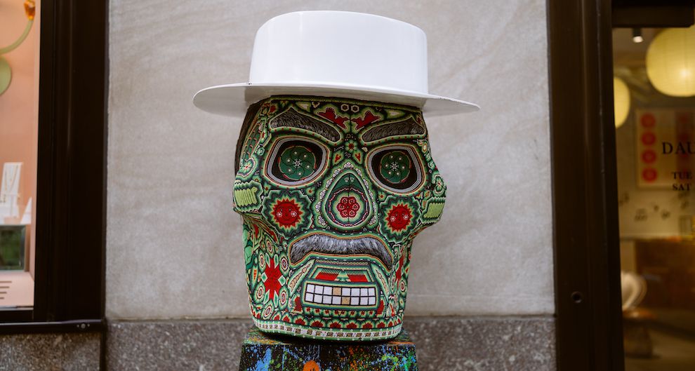 Sugar skull in a white hat in The Channel Gardens
