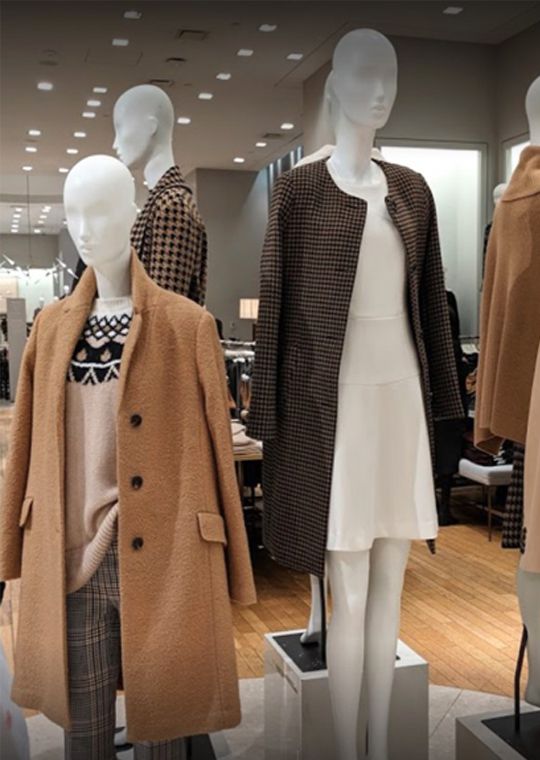 Ann Taylor mannequins wearing coats