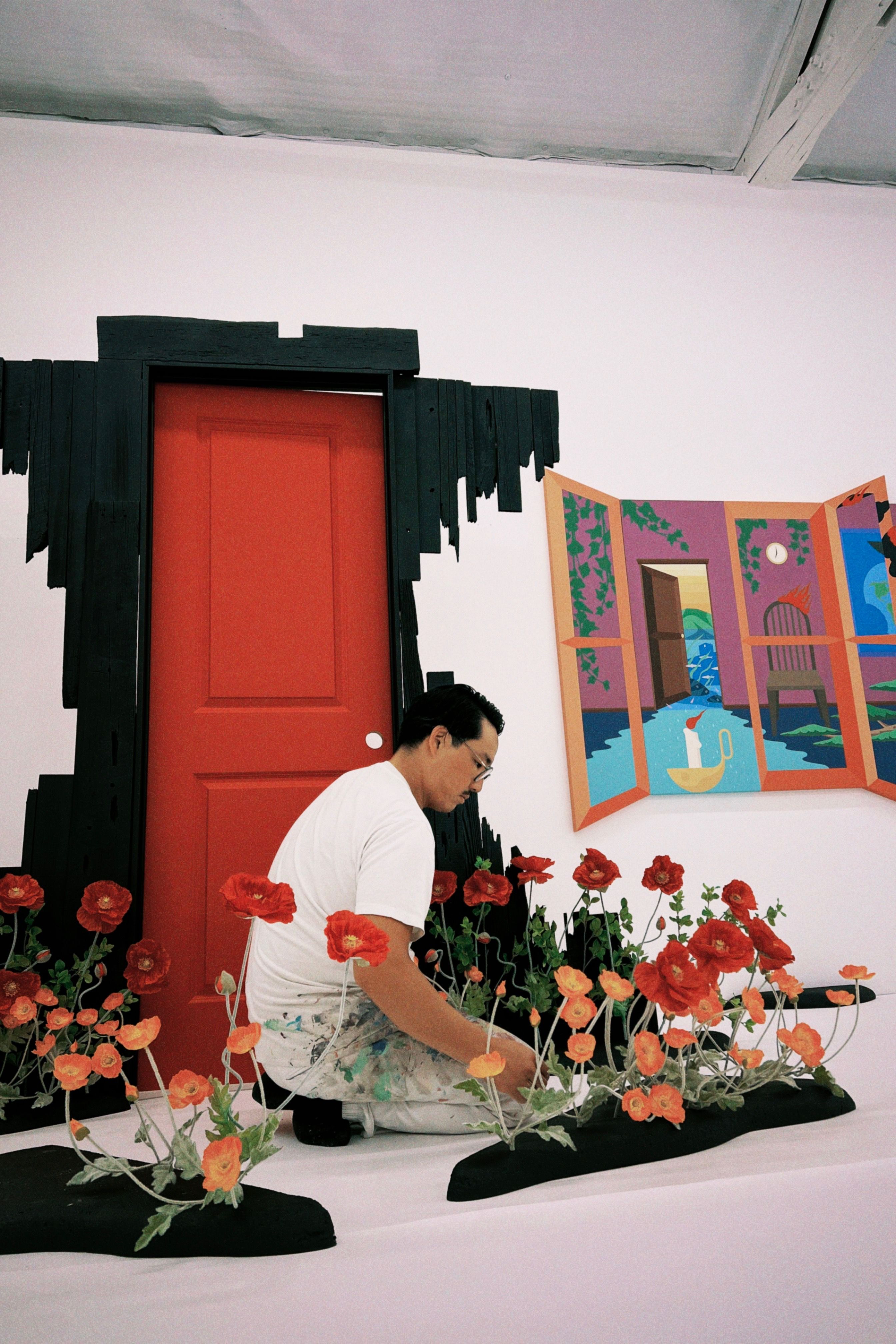 Greg Ito working on his art