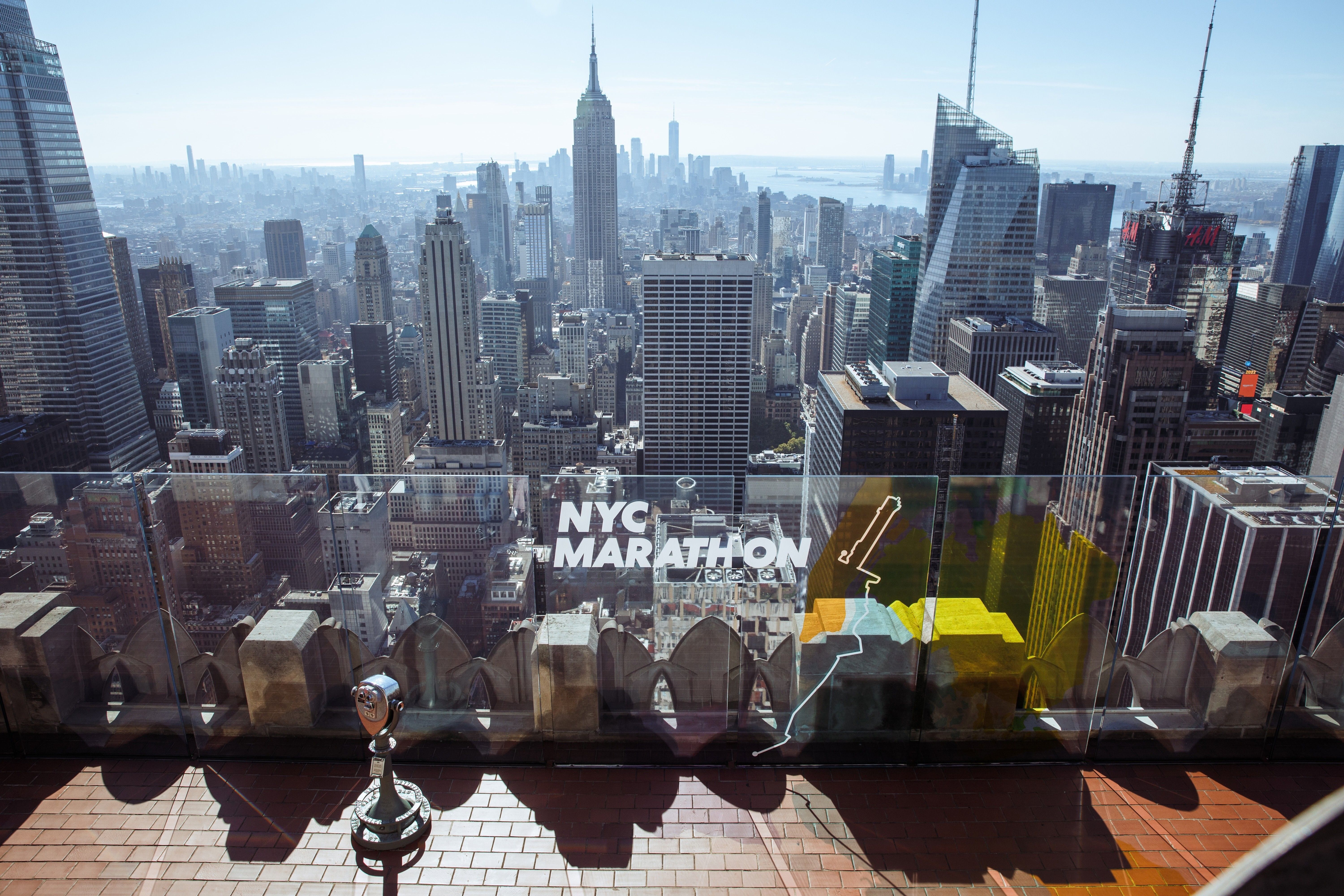 NYC Marathon decals on the glass walls at Top of the Rock