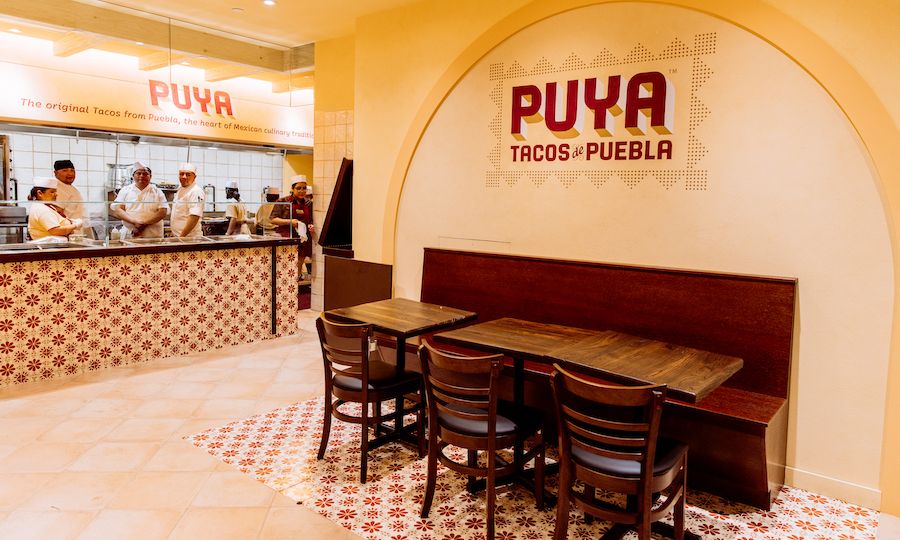 Table and chairs at Puya Tacos de Puebla at Rockefeller Center