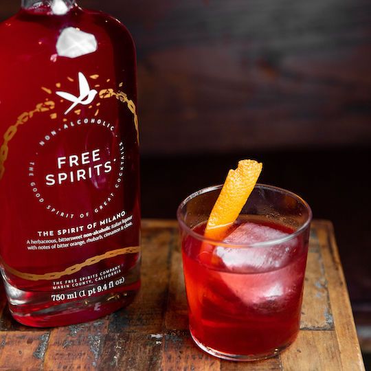 Non-alcoholic negroni and a bottle of a non-alcoholic spirit