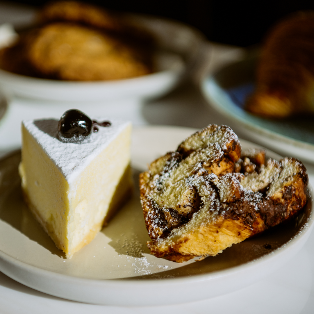 A slice of cheesecake and a pastry from The Weather Room at Top of the Rock